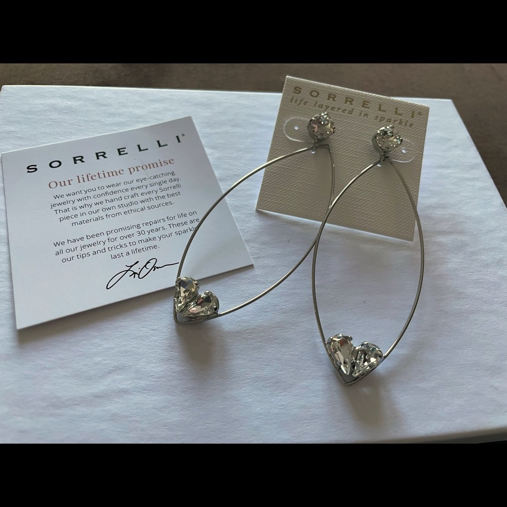 Sorrelli Earrings. Large tear drop shape with faux diamond hearts.